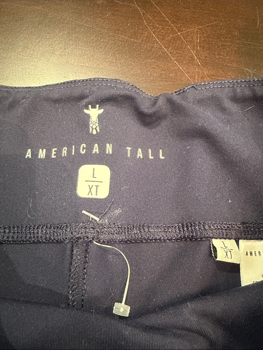 High-Rise Navy Performance Leggings with Pocket Detail - Picture 2 of 4
